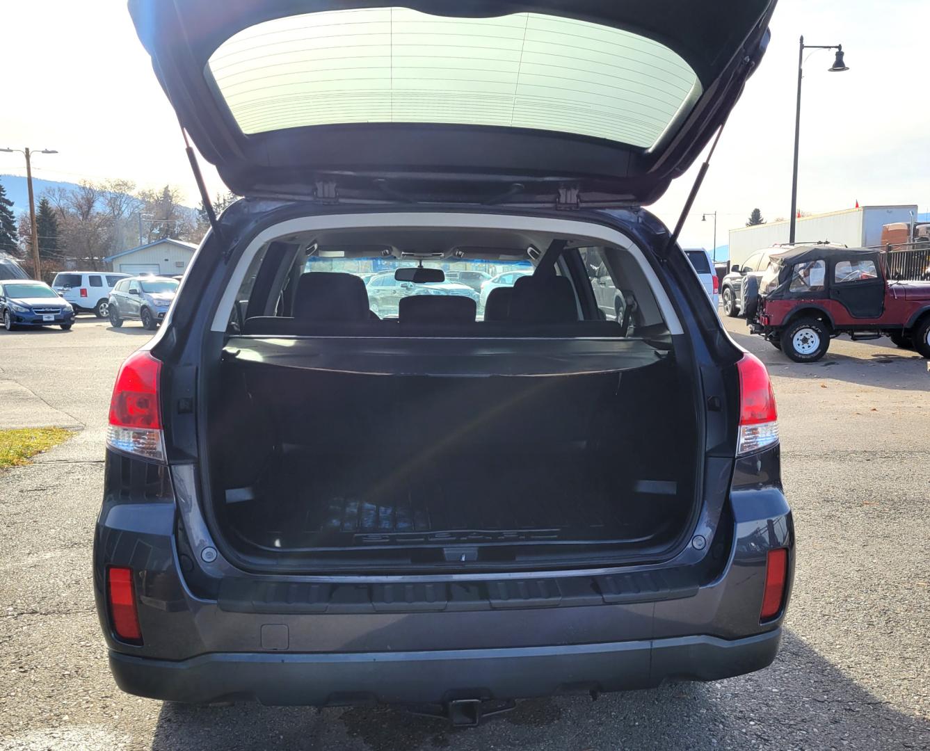 2010 Grey /Blue Subaru Outback Premium (4S4BRBCC7A3) with an 2.5L engine, Automatic transmission, located at 450 N Russell, Missoula, MT, 59801, (406) 543-6600, 46.874496, -114.017433 - Automatic Transmission. Power Drivers Seat. Heated Seats. Air. Cruise. Tilt. AM FM CD. Bluetooth. Newer All Season Tires. Tow Hitch. - Photo#7